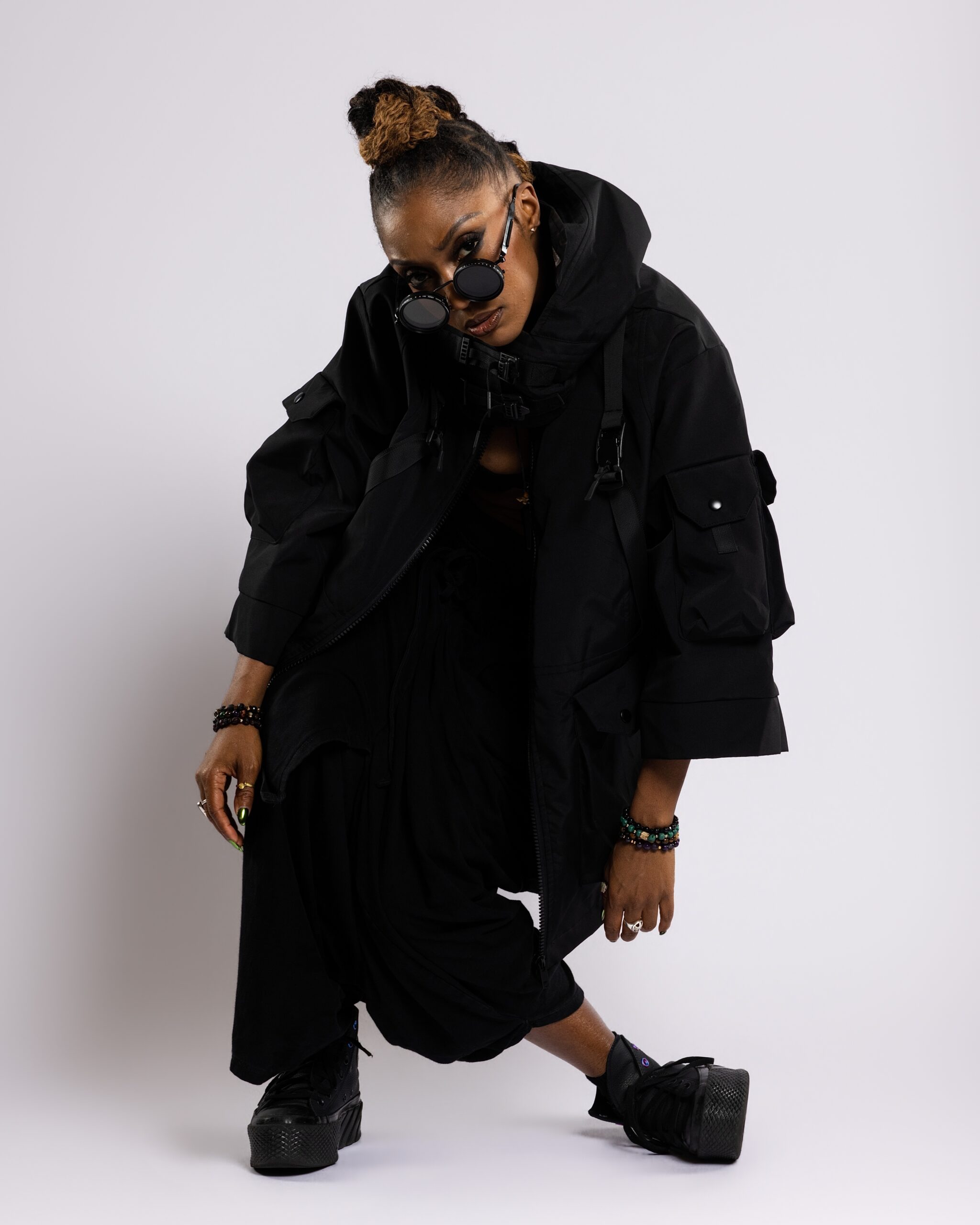 Comfort Fedoke in a studio movement portrait