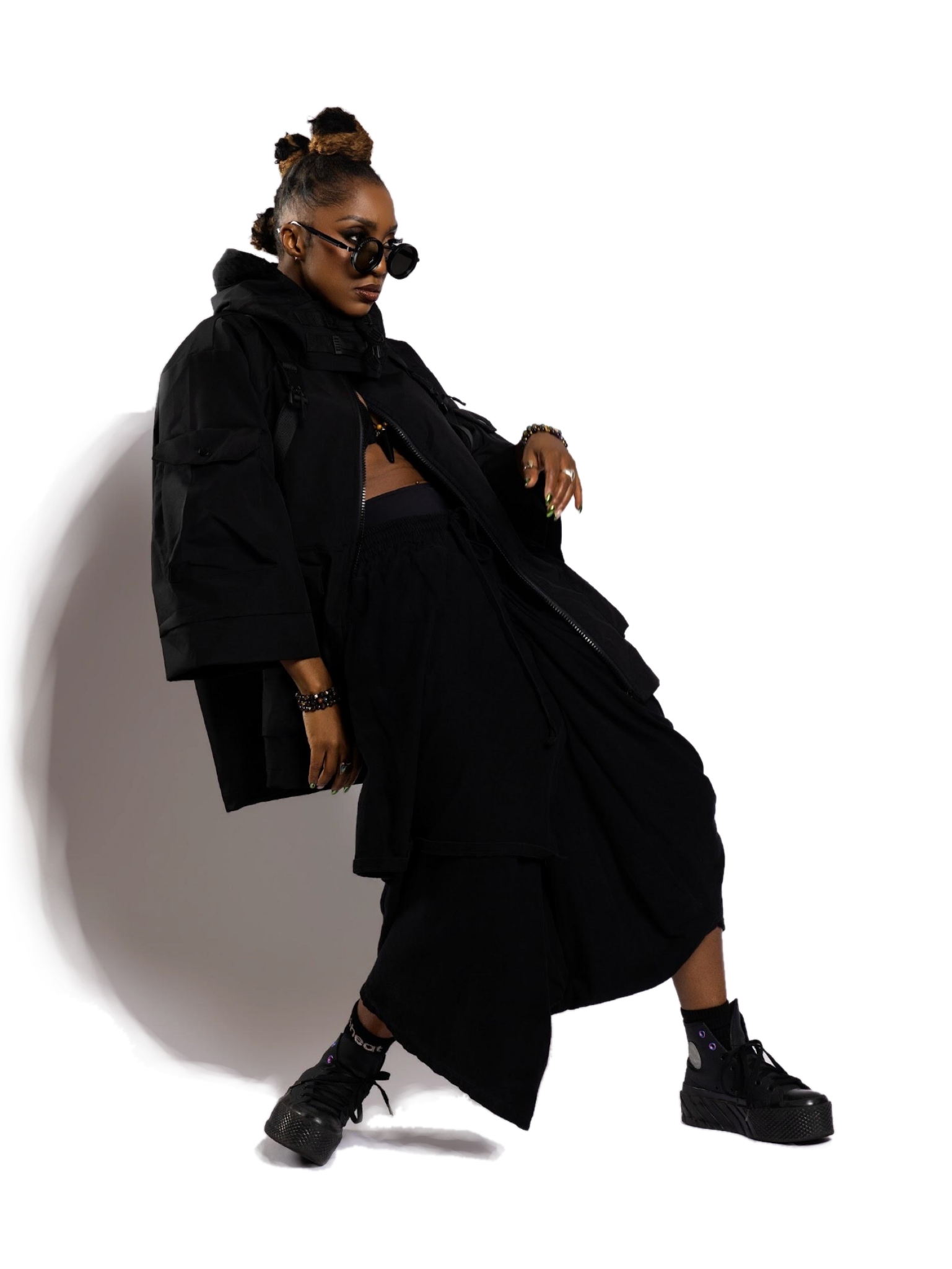 Comfort Fedoke in a full-length editorial pose
